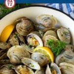 This steamed clams recipe is fresh shellfish cooked with garlic, butter, herbs and lemon.