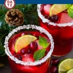 This cranberry margarita recipe is cranberry, orange and lime flavors mixed with tequila, triple sec and grenadine to make a colorful and refreshing cocktail.