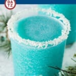This Jack Frost cocktail is a frozen drink that contains coconut cream, blue curacao, pineapple juice and rum.