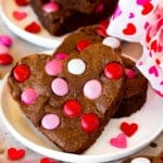 Valentine brownies on a plate, decorated with M&M's.