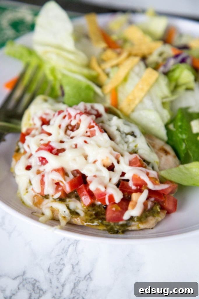 Italian Turkey Cutlets - thick pieces of turkey seared and topped with pesto, tomatoes, and melty cheese. Ready in 15 minutes, and great any night of the week!