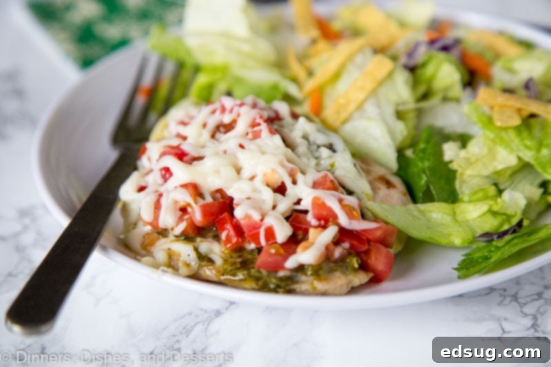 Italian Turkey Cutlets - thick pieces of turkey seared and topped with pesto, tomatoes, and melty cheese. Ready in 15 minutes, and great any night of the week!