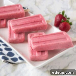 strawberry greek yogurt popsicles on a plate