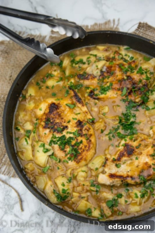 Chicken in creamy artichoke pan sauce, ready to serve
