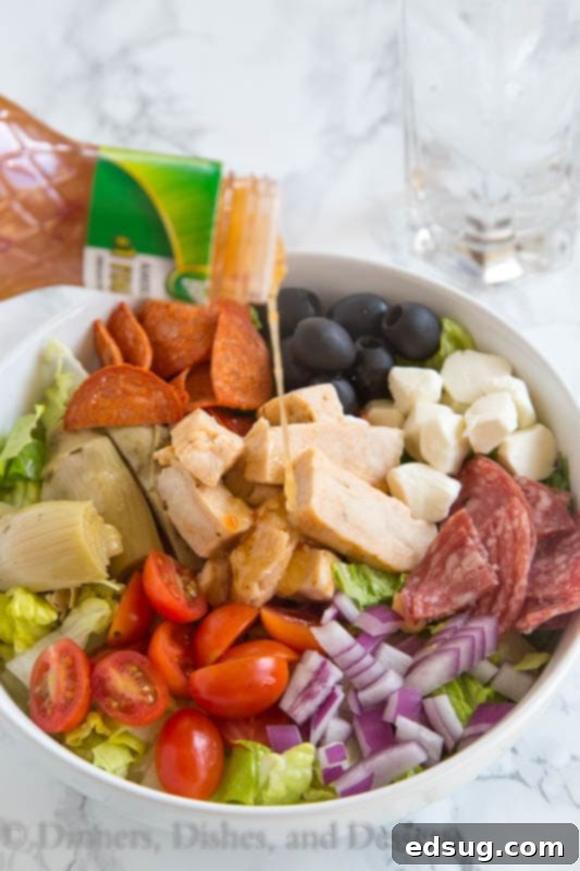 grilled chicken antipasto salad in a bowl