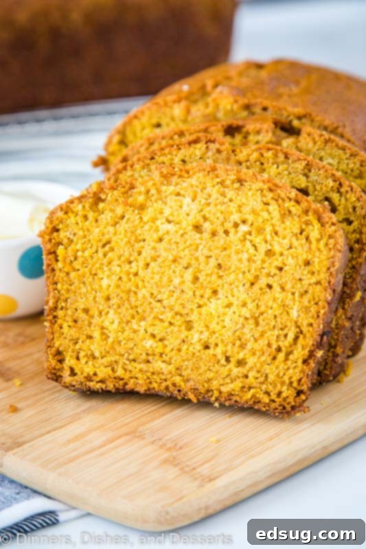 Moist and tender slice of pumpkin bread. Full of all the fall spices you love.