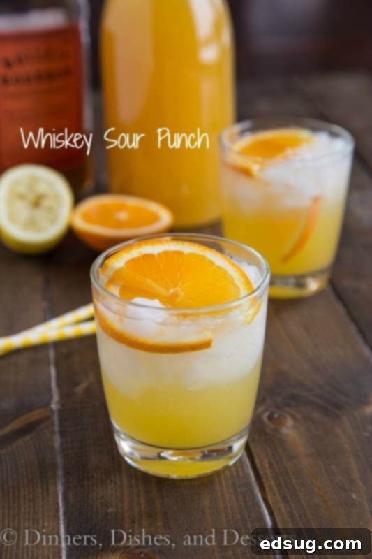 Whisky Sour Punch, a fizzy and fun punch with orange juice, lemon juice, and bourbon.