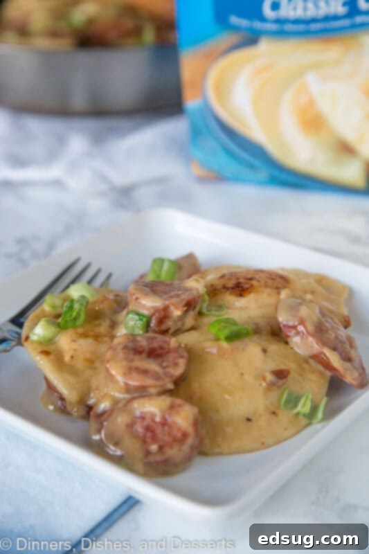 Hearty Sausage and Pierogi Skillet 4 A plate of food on a table, with Pierogi and Sausage