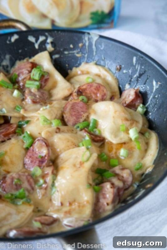 Hearty Sausage and Pierogi Skillet 5 A close up of a plate of food, with Pierogi and Sausage