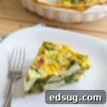 Close-up of Indian spiced quiche, showing its golden crust and savory filling