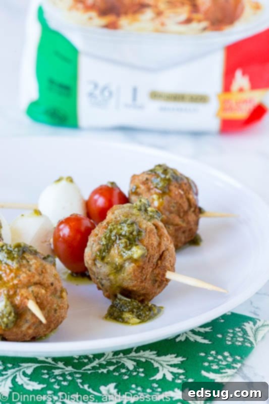 meatball skewer with mozzarella cheese, tomato, meatball and pesto