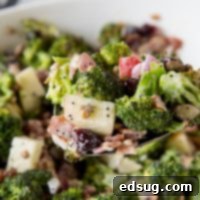 Broccoli Salad Recipe - roasted broccoli salad with bacon, apples, cranberries, almonds, sunflower seeds and a creamy poppy seed dressing!