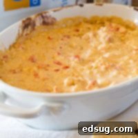 Spicy Shrimp Dip - a quick and easy dip that is great to serve at any get together. You can make ahead and heat right before guests arrive! 
