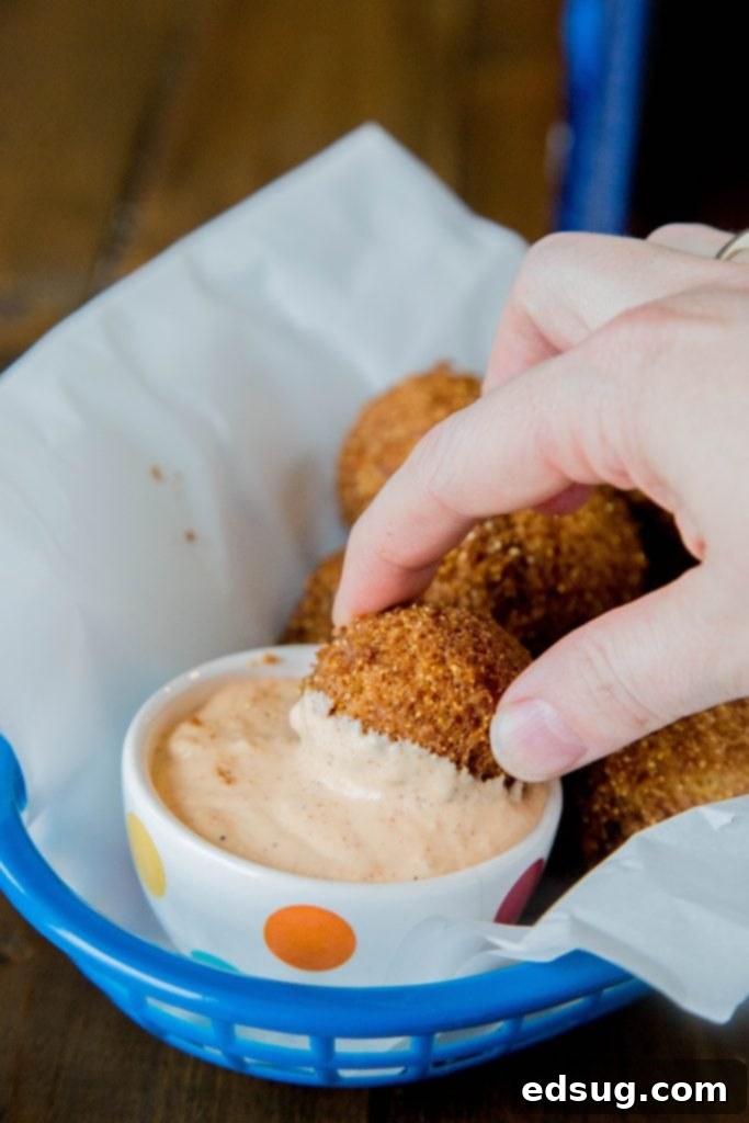 Homemade Hush Puppies Recipe - the lightest and fluffiest hushpuppies ever. So easy to make, delicious, crispy and great for game day, snacks, or even a side dish with dinner. 