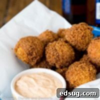Homemade Hush Puppies Recipe - the lightest and fluffiest hushpuppies ever. So easy to make, delicious, crispy and great for game day, snacks, or even a side dish with dinner.