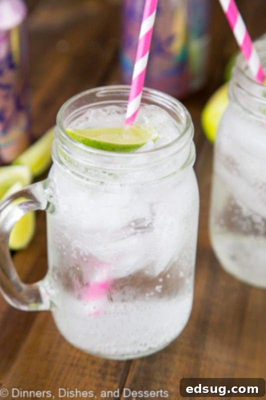 Crisp Vodka Soda served in a mason jar with lime