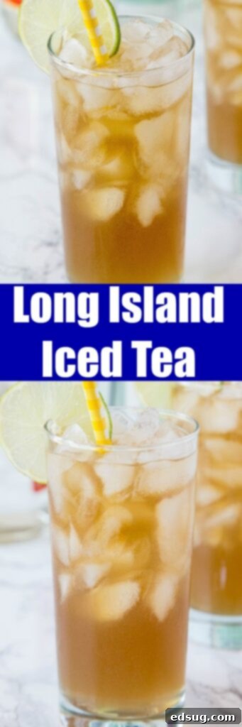 A close up of a long island iced tea in a glass, with a stunning blue backdrop