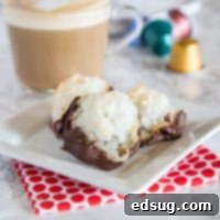 plate of coconut cookies dipped in chocolate