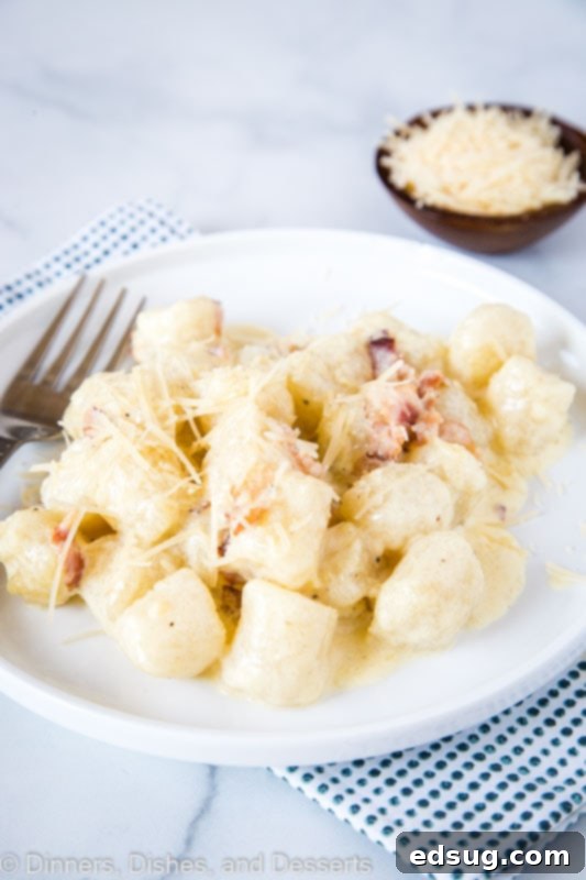 Enjoy this rich and creamy Cauliflower Gnocchi Carbonara, a quick, easy, healthy, and delicious dinner option for those seeking arthritis-friendly meals.