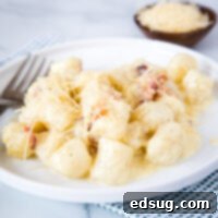 A plate of cauliflower gnocchi carbonara, a healthy and delicious meal.