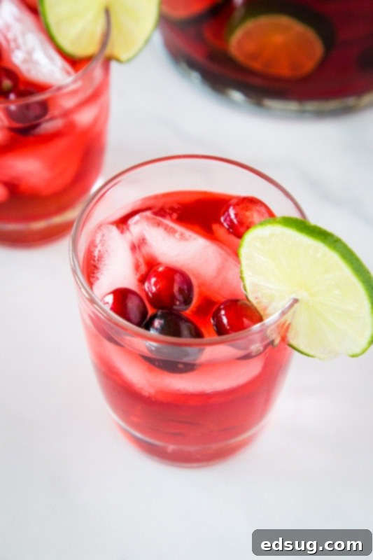 Punch is a great to serve during the holidays.  Make a big batch of this Jingle Juice today!