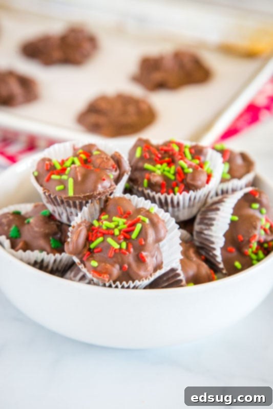 A festive platter of homemade slow cooker peanut clusters, perfect for holiday gatherings.