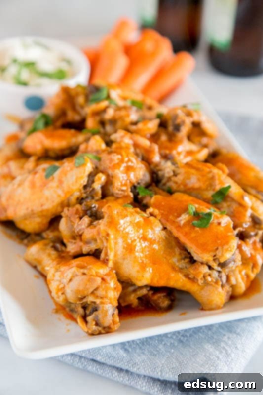 Crispy Instant Pot Buffalo Chicken Wings, perfect for game day or a party appetizer, featuring golden-brown skin and a vibrant sauce