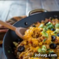 Resourceful Kitchen Creations 4 Flavorful Mexican Rice Skillet, a one-pot meal packed with authentic flavors, ready in under 30 minutes for a quick dinner.
