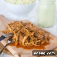 Flavorful Cafe Rio Pork, slow-cooked to perfection, ready to be shredded.