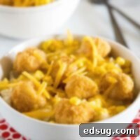 A close-up of a delicious and hearty homemade KFC Bowl, layered with comfort.