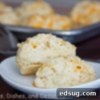 A basket of warm, fluffy Cheddar Bay Biscuits, golden brown and perfectly inviting.