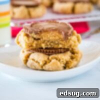 close up stacked peanut butter cookies with peanut butter cups