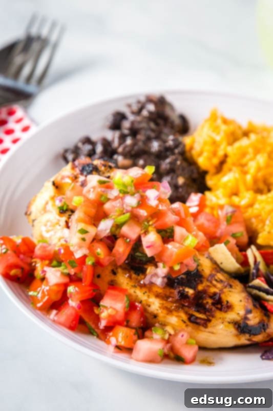 grilled chicken with tomatoes on top