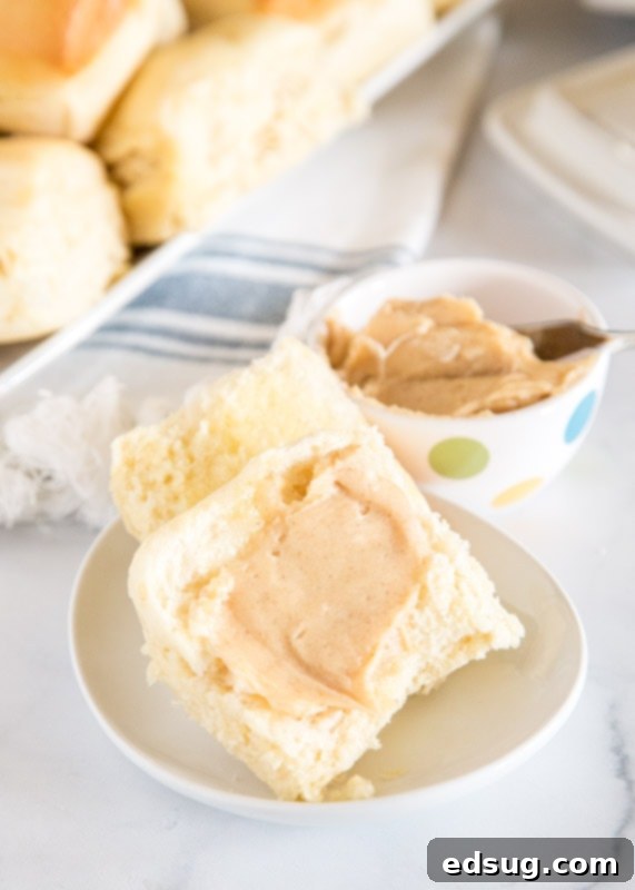 roll with cinnamon honey butter spread on it