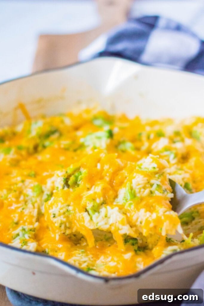 Cheesy Broccoli Rice Casserole 2 broccoli rice casserole on serving spoon