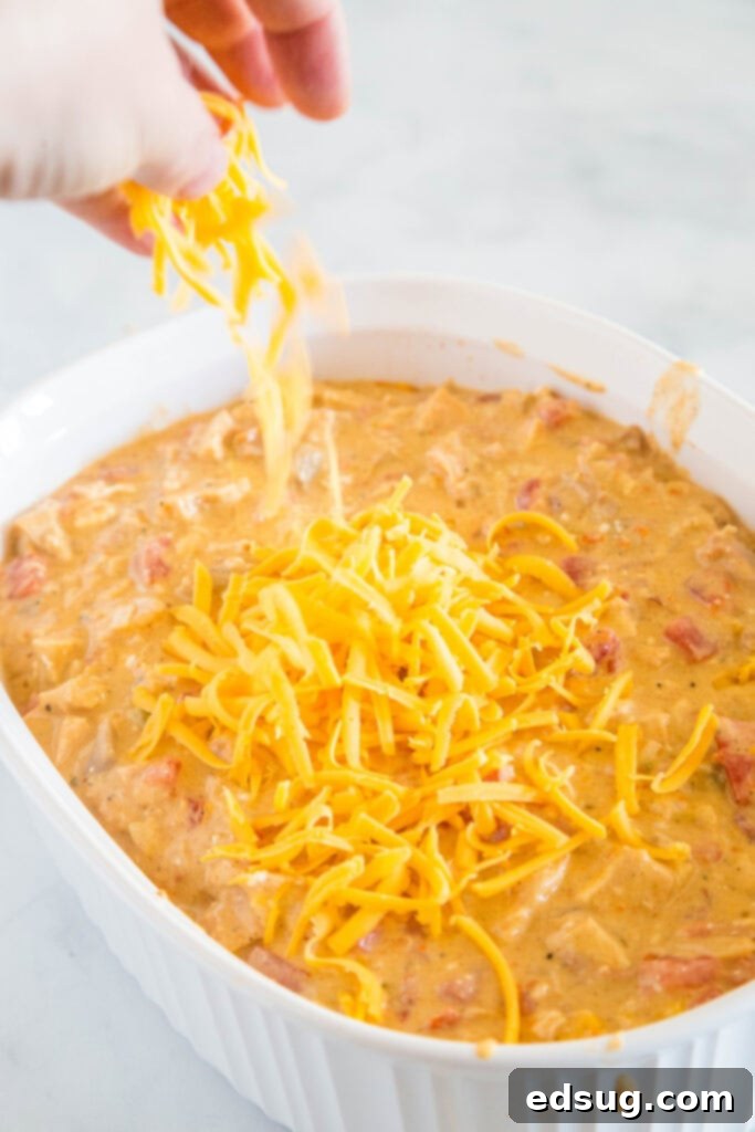 sprinkling cheese on casserole