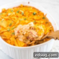 close up of casserole being scooped out of the dish