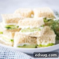 cropped in of a plate of cucumber tea sandwiches