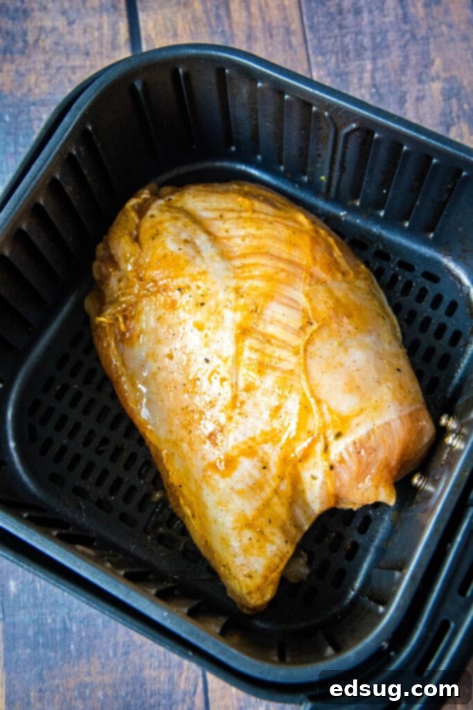 Crispy Air Fryer Turkey Breast 4 turkey breast in air fryer ready to cook