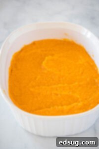 sweet potatos mashed in a casserole dish