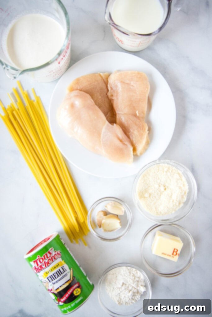 Ingredients laid out for Cajun Chicken Alfredo