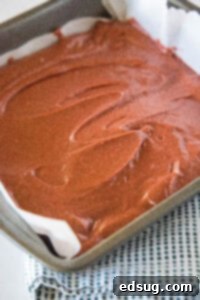 red velvet brownie batter in baking pan