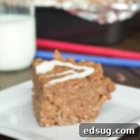 chocolate peanut butter krispie treats on a plate
