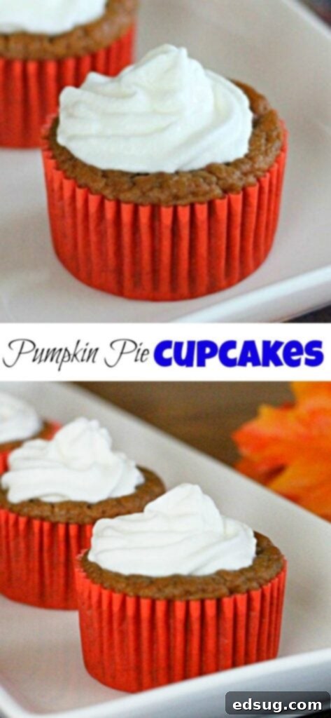 Close-up of a stack of Pumpkin Pie Cupcakes, generously topped with swirling whipped cream, highlighting their rich texture and appeal.