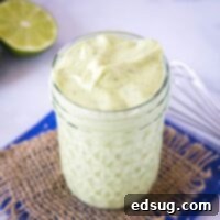 close up jar of avocado dressing