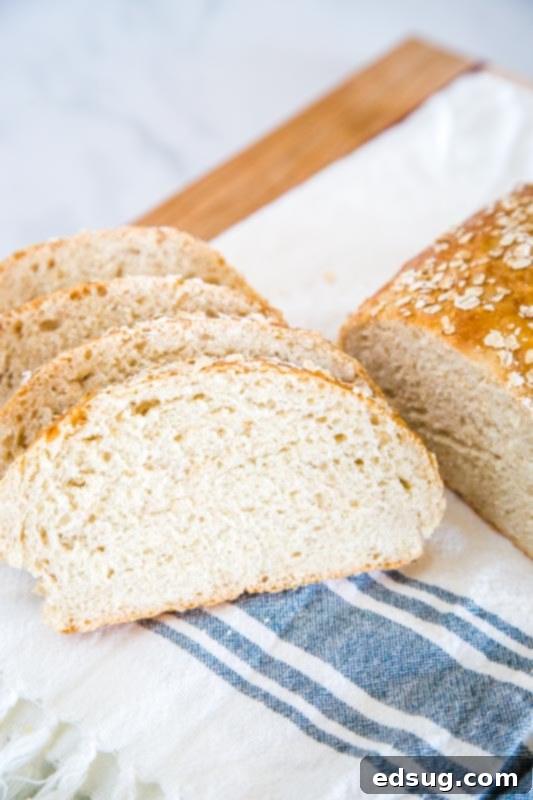 Easy no knead honey oat bread that is great for breakfast, snacking, or dinner