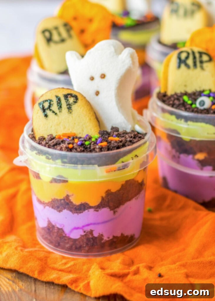 Graveyard Halloween Pudding Cup decorated with an RIP cookie, ghost, and sprinkles