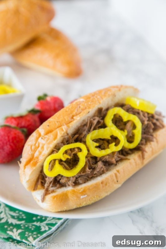 Crock Pot Italian Beef topped with peppers
