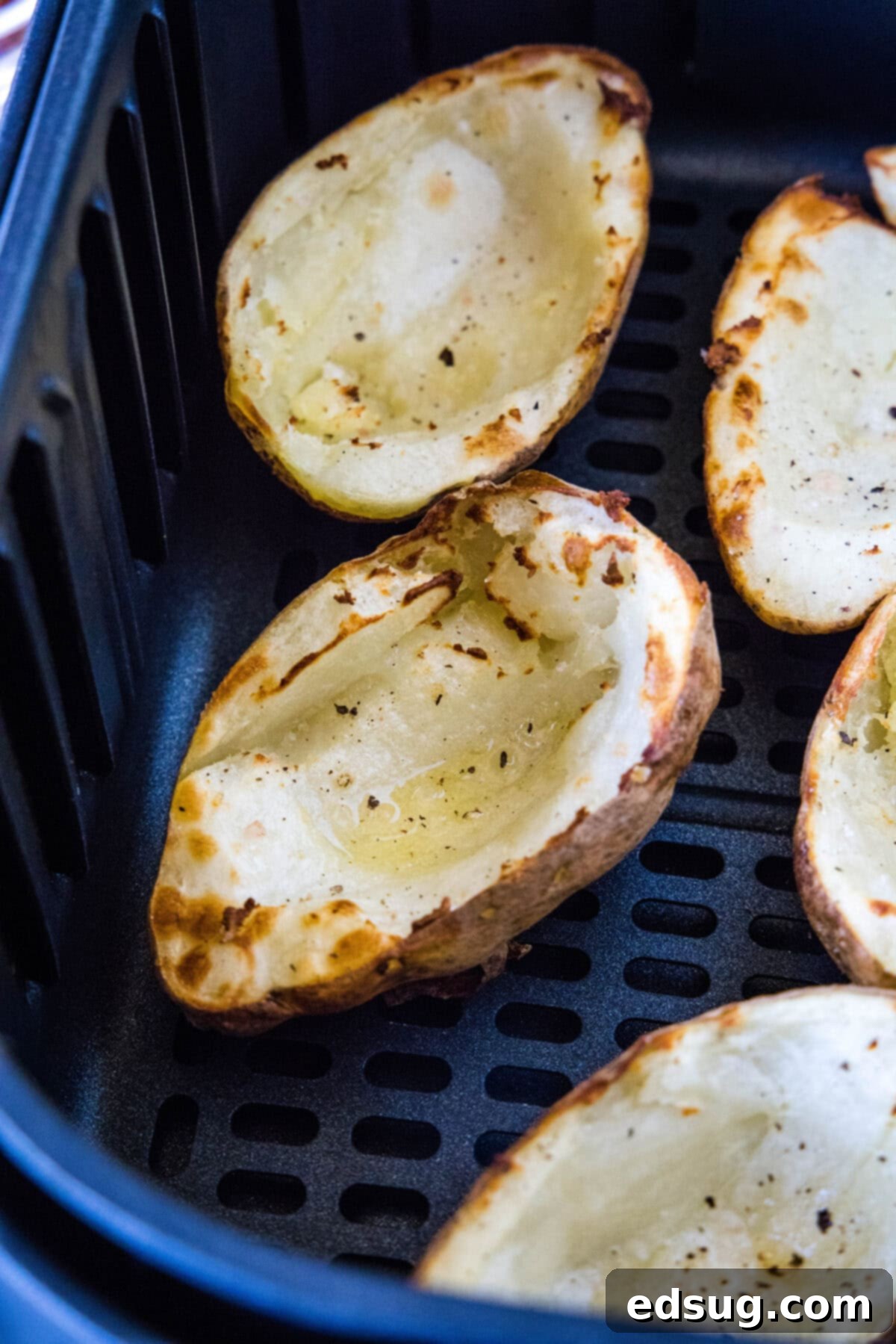 Crispy Air Fryer Potato Skins 4 crispy potatoes in air fryer