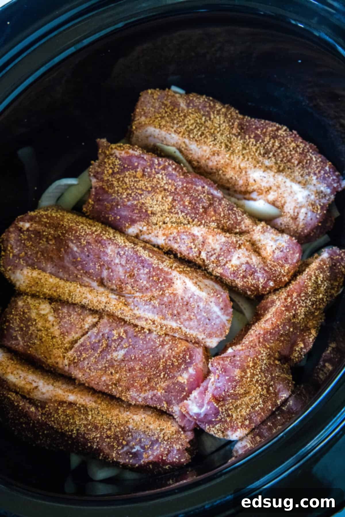 Fall Off The Bone Slow Cooker Country Ribs 4 seasoned country style rubs arrange in crockpot